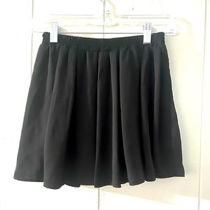 John Galt black pleated mini skater skirt